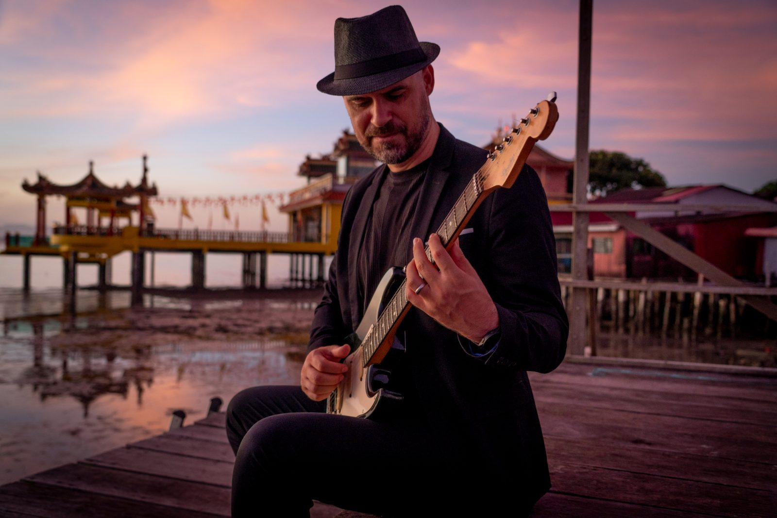 Luis Coelho at dusk by the water